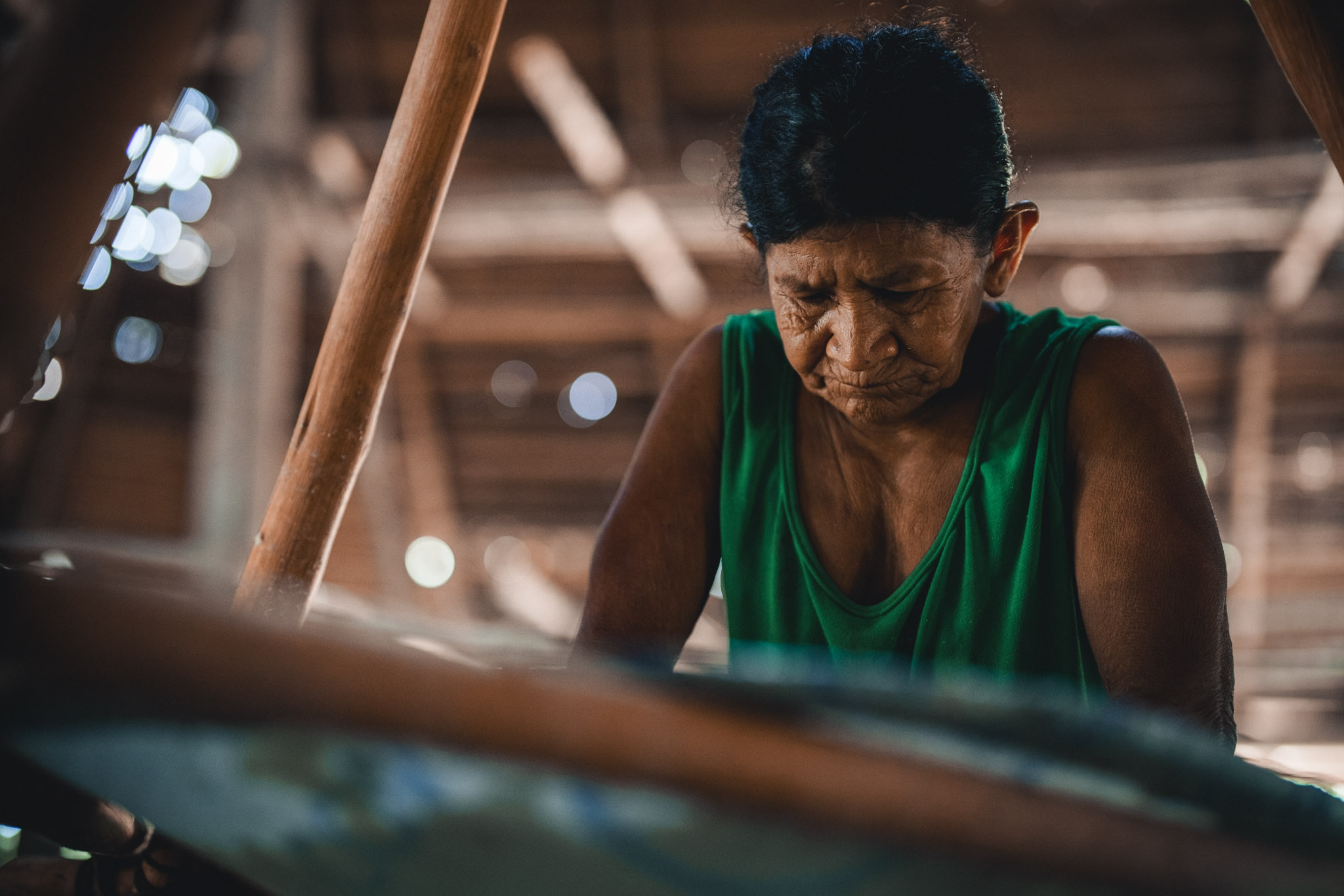 colombian indigenous wife preparing manioc bread casabe